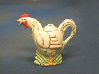 A Clarice Cliff teapot in the form of a standing chicken, the base marked Clarice Cliff 9" (slight chip to base)