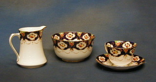 A 26 piece Derby style tea service viz: 2 bread plates, 4 plates, 9 cups and 11 saucers
