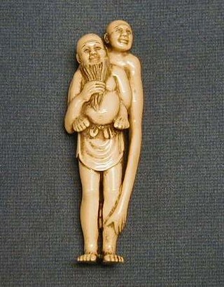 A 19th Century Japanese Netsuke in the form of 2 standing gentleman "Ashinaga and Tenaga"