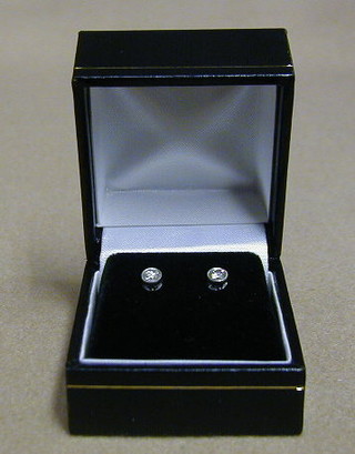 A pair of lady's diamond ear studs (approx 0.38ct)