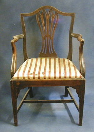 An 18th/19th Century Country Hepplewhite camel back carver chair with upholstered drop in seat, on square tapering supports with H framed stretcher