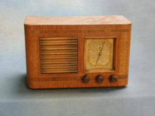 A Little Mistro pilot radio contained in an oak case
