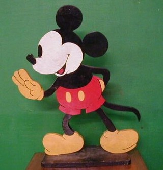 A pair of 1930's wooden painted cut out figures of Mickey & Minnie Mouse 24"