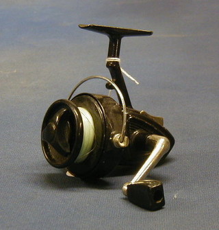 An unmarked multiplying fishing reel