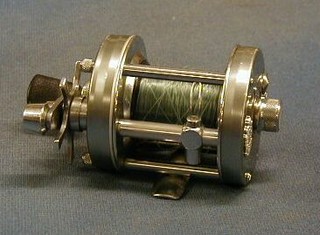 An Abu Ambassador G500C fishing reel with instructions