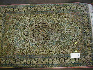 A fine quality Persian silk pink ground and floral patterned rug 47" x 30" (slight wear)