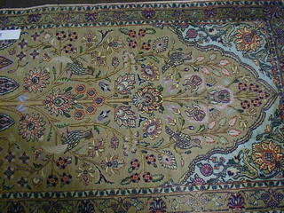 A fine quality Persian silk rug decorated Tree with birds 59" x 36"