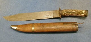 A 19th Century Bowie knife with 10" blade and staghorn handle contained in a wooden scabbard