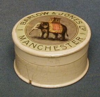 A 19th Century circular pot lid and cover for Barlow & Jones of Manchester (cracked)