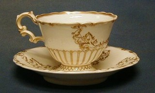 A 19th  Century Copeland & Garrett Rockingham style breakfast cup and saucer, the base marked Copeland & Garrett 5512 (cracked)