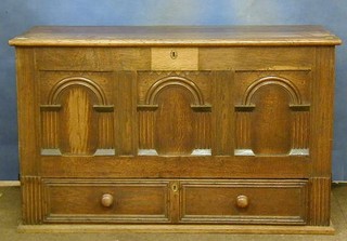 A  17th/18th Century oak mule chest with hinged lid and arcaded panels, the base fitted 1 long drawers 49"