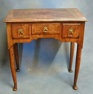 A Queen Anne walnutwood low boy with crossbanded and inlaid top, fitted 1 long drawer flanked by 3 short drawers, raised on club supports 29"