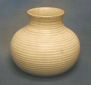 An  oatmeal Art Pottery vase, base marked KP 8"