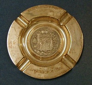A circular silver ashtray the Lewes Award for Marketing 1989 the centre decorated the crest of the Worshipful Company of Fruiterers 4"  3ozs