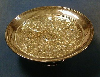 An impressive Edwardian circular silver plated embossed tazza decorated warring scenes 9 1/2"