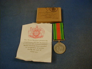 A Defence medal in box of issue