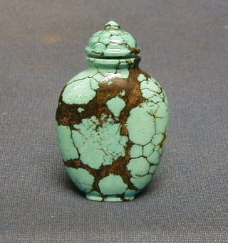 A 19th Century Oriental turquoise snuff bottle of oval form 2"