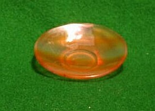A circular Oriental veined glass/hardstone saucer 2"