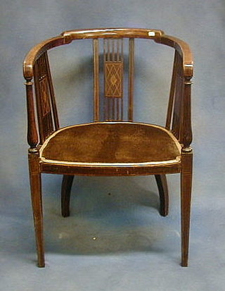 An Edwardian inlaid mahogany tub back chair