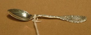 A Tiffany Sterling silver teaspoon, decorated a bridge and marked Golden Rod