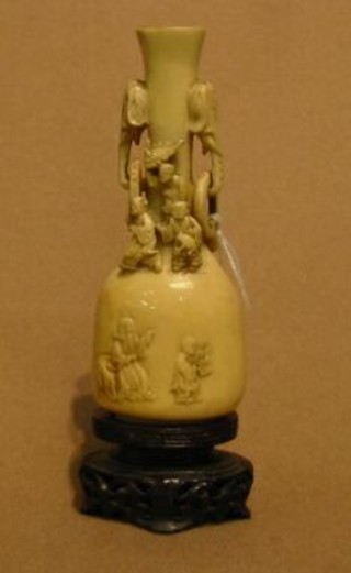 A 19th Century carved Japanese ivory vase with elephant ring handles 5"