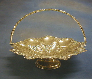 An embossed silver plated pedestal cake basket