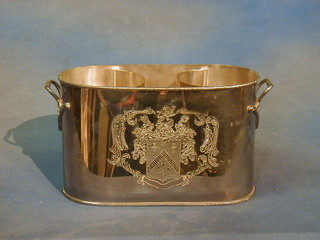 A modern silver plated 2 bottle wine cooler with armorial decoration