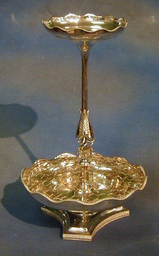 A silver plated table centre piece, raised on a circular rosebowl with tripod base 17"