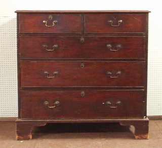 A Georgian mahogany chest of 2 short and 3 long drawers raised on bracket feet 41"