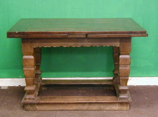 A 17th Century oak drawleaf dining table, raised on square bulbous columns, with block stretcher, having later top, 44"