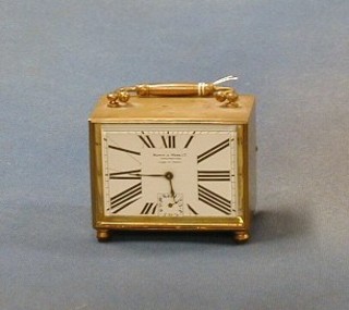 A 19th/20th Century 8 day travelling alarm clock, the 4" square enamelled dial with Roman numerals marked Mappin & Webb Johannesburg