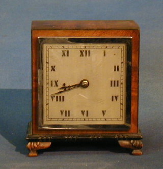 A 1930's French 8 day bedroom timepiece with square silvered dial contained in a walnutwood case