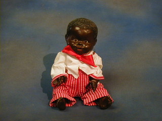 A black baby doll with squeaker