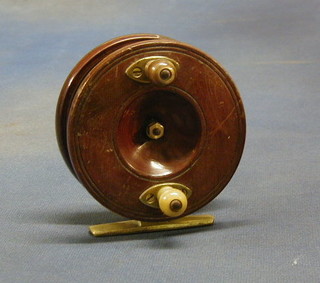A 19th Century brass/wooden Starback fishing reel
