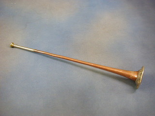 A 19th Century copper and embossed silver coaching horn by Henry Pottery 30 Charring Cross London, 23"