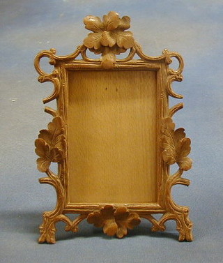 A 19th Century carved wooden easel photograph frame 10"