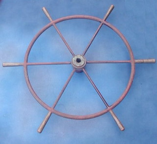 An iron ships wheel 43"