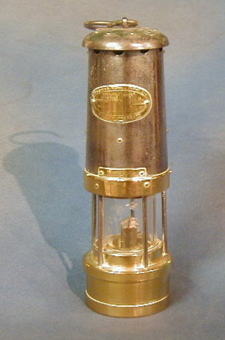 A brass and polished steel minor's Davey lamp by E Thomas & Williams Ltd