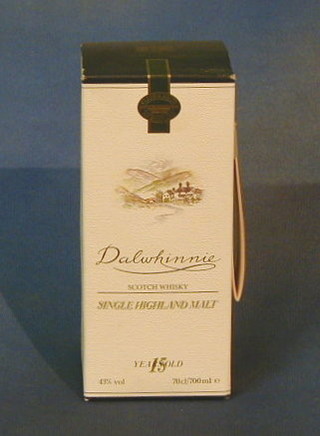 A bottle of 15 year old Dalwhinne single Highland malt whiskey