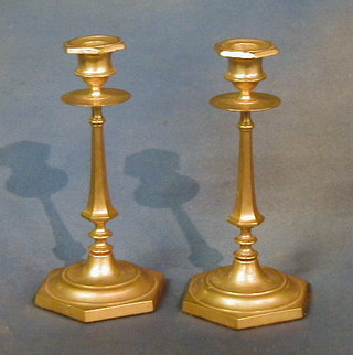 A  pair of 19th Century brass candlesticks 9"