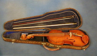 A 20th Century violin with label Karl Bitterer, dated 1942 and with Stradivarius facsimile label 14 1/2" contained in a fibre case with 2 bows