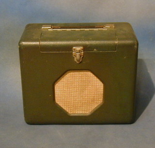 A Robert's portable radio contained in a green fibre case No. 48569