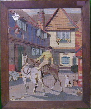 A 1930's Berlin wool work picture depicting huntsman and horse 20" x 17" contained in an oak frame