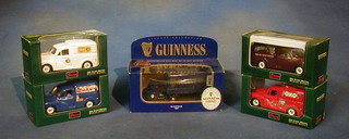 A Corgi die cast Guiness articulated lorry and 3 Saico die cast model cars