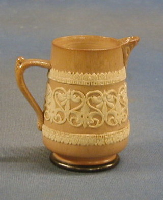 A Doulton Lambeth stoneware jug, the base incised ET, 4"