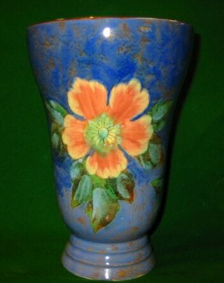 A Royal Doulton vase decorated flowers, the base marked Royal Doulton A and impressed 8125 8"