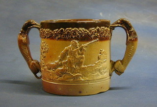 A "Doulton" twin handled loving cup decorated hunting scenes with greyhound handles (f) 6"