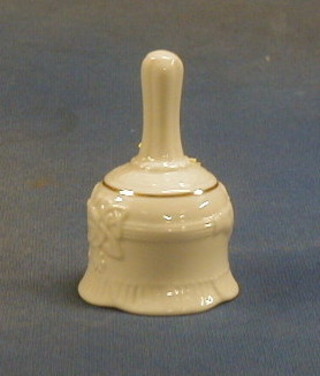 A Beleek hand bell with purple mark 3 1/2"
