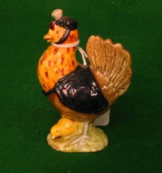 A Beatrix Potter figure "Sally Henny Penny 1974" brown mark to base,