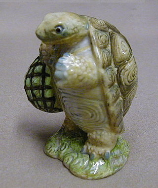 A Beatrix Potter figure "Alderman Ptolemy"